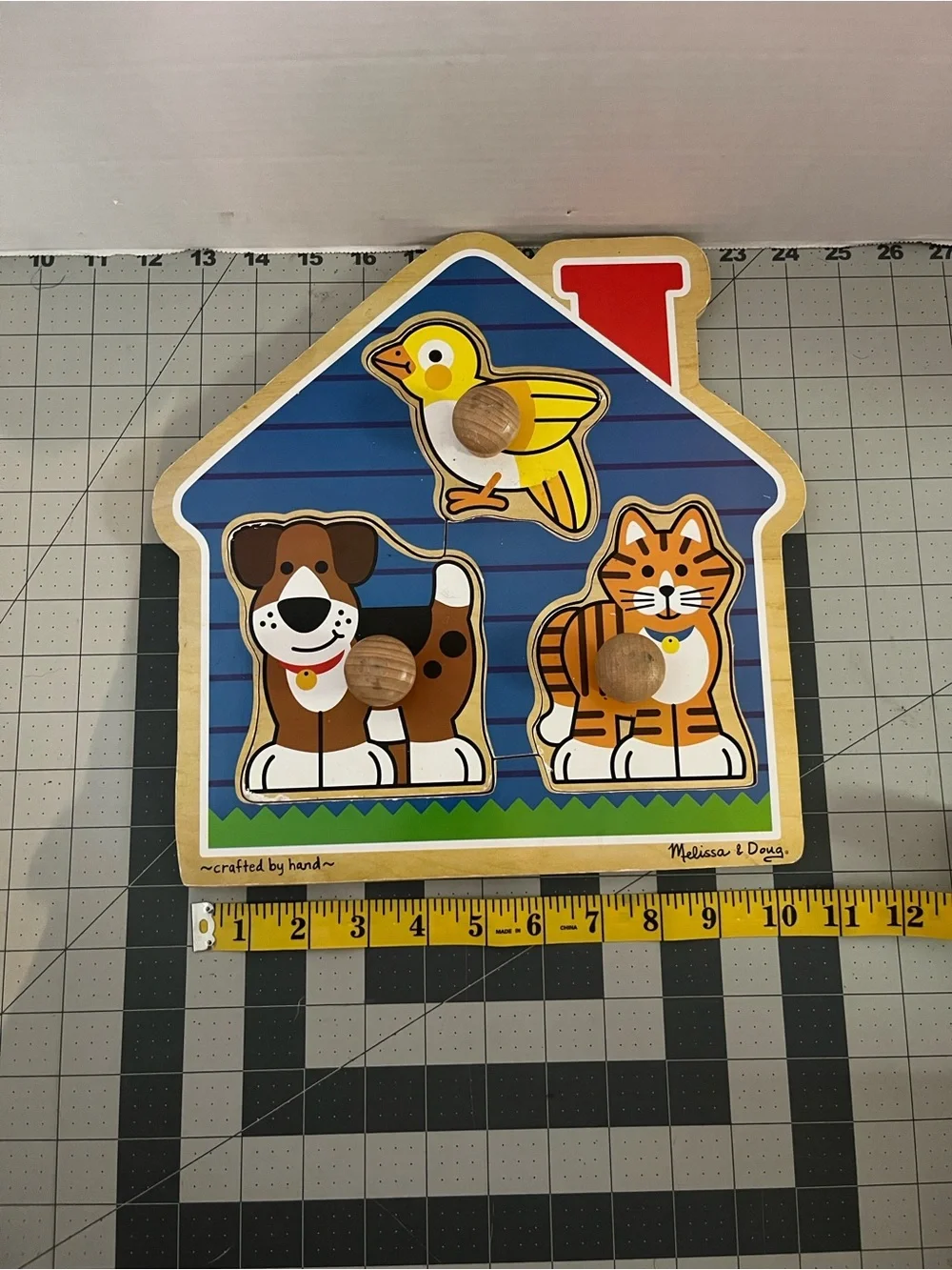 Melissa & Doug Wooden House Peg Puzzle with Blue, Yellow, Brown, Orange